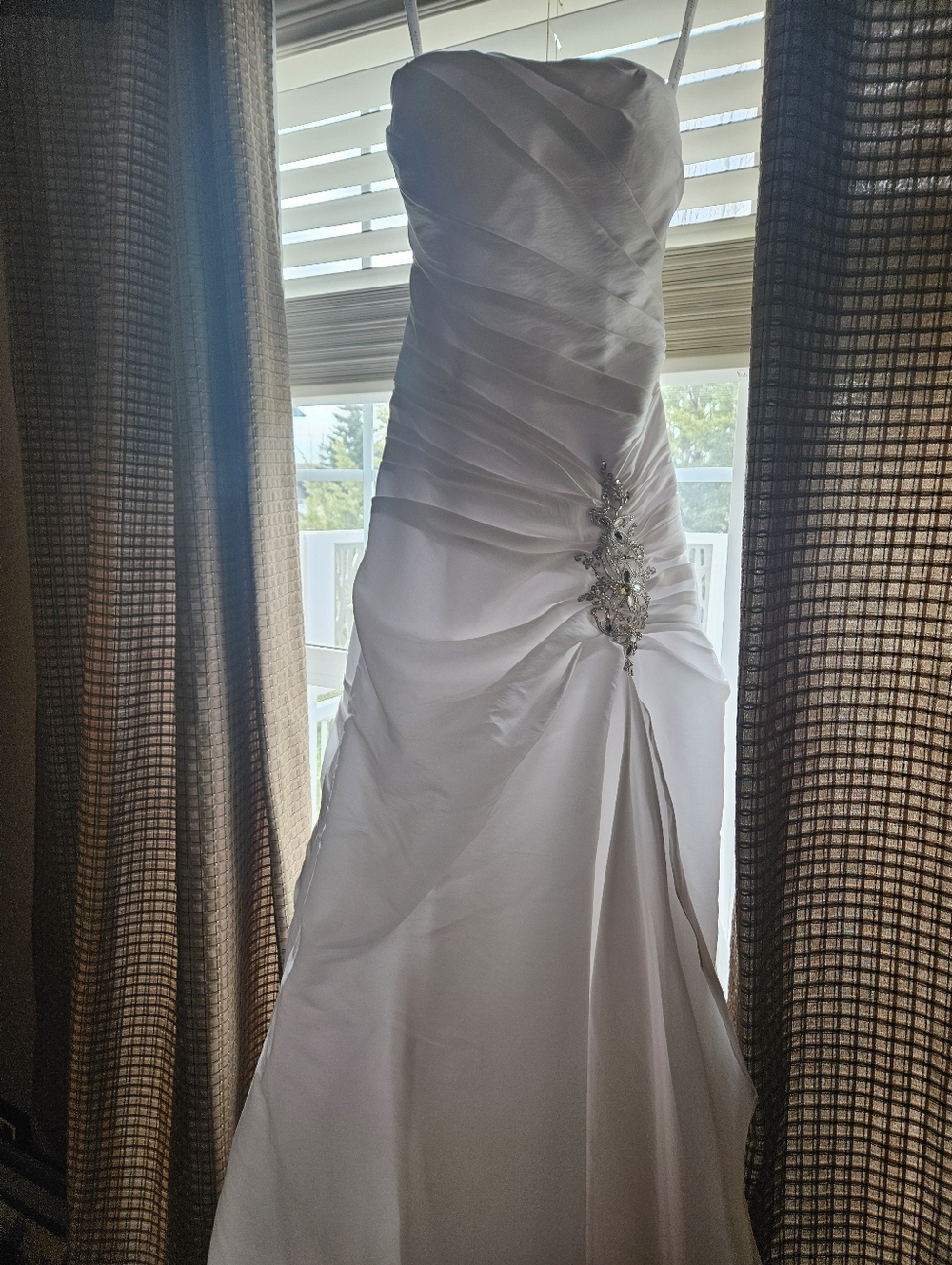 White Strapless Ruched Bridal Gown with Beaded Brooch
